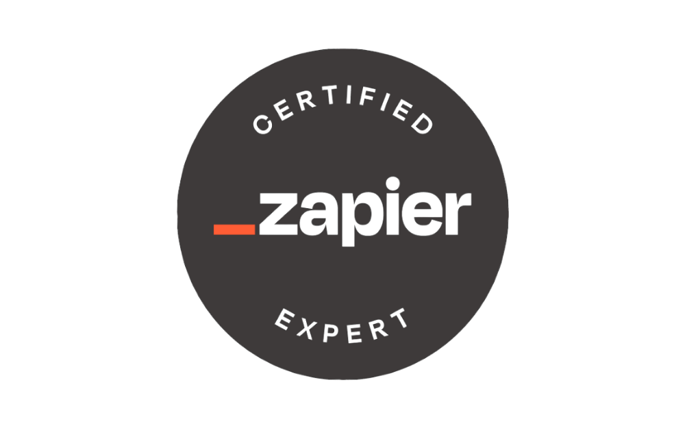 Zapier Certified Expert badge (dark circular medallion with white 'zapier' logo and 'CERTIFIED EXPERT' text around the edge)